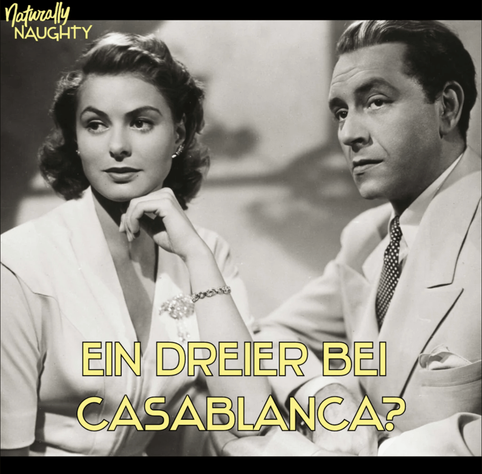 Ausschnitt aus dem Film Casablanca. Eine elegant gekleidete Frau und ein ebenfalls elegant gekleideter Mann sitze nebeneinander. Oben links Logo von Naturally Naughty. Unten im Bild folgender Text: ''Ein Dreier bei Casablanca?''.